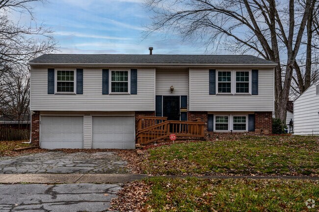Many lots in Austin Village are split-level homes featuring towering trees.