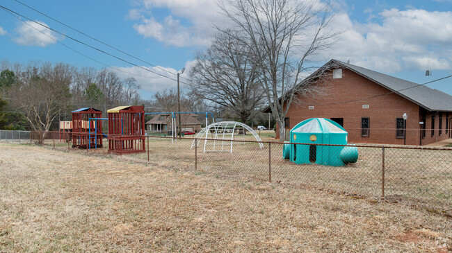 Students at The Talented Tenth Boys' Academy of NC enjoy this playground at recess.