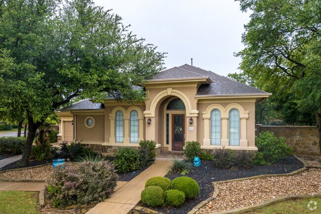 Deerfield At Brodie home boasts beautiful landscaping.