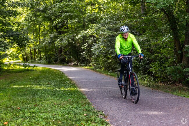 Cyclists rave over the paved Rock Creek Trail found in Aspen Hill Local Park.