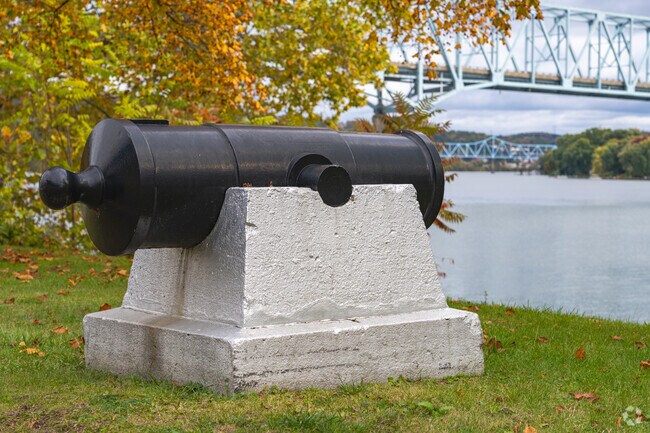 You can see old replicas of cannons that face the river in Rochester Riverfront Park.