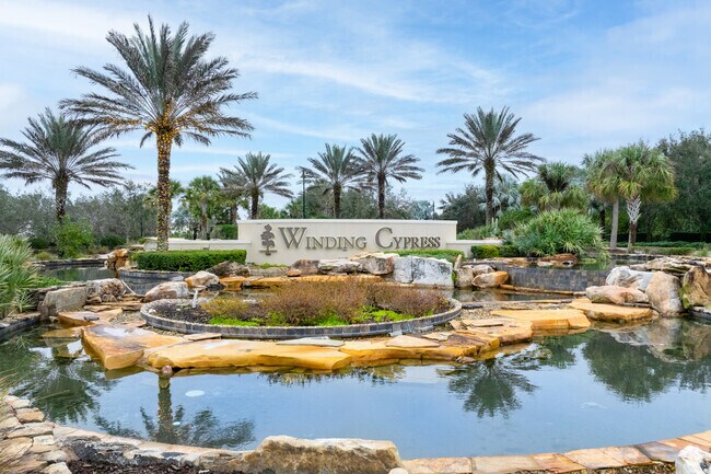 You know you're home in Winding Cypress when you reach the beautiful entrance signage.