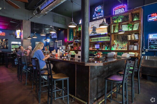 Pull on up to the bar at Windy City Grille and order up a refreshing drink.