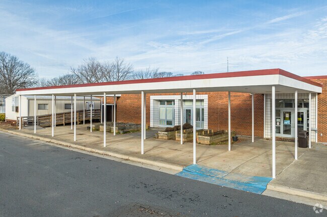 Walkertown Elementary features a covered walkway for drop-offs and pickups.
