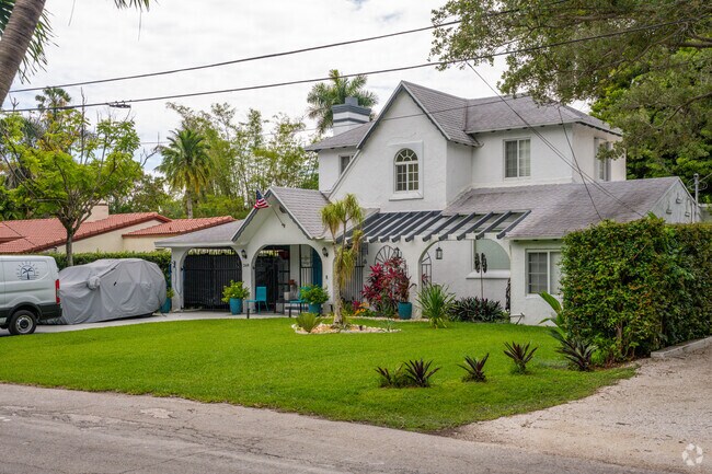 Large two-story ranch-style home on a canal in El Portal.