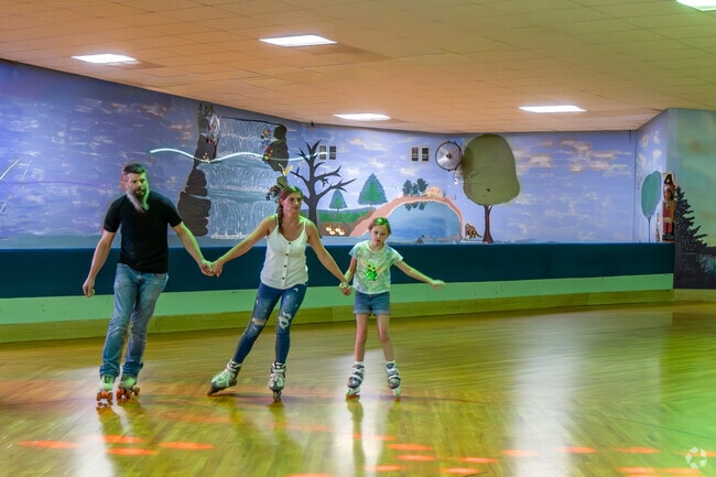 Families in Hughesville love the skating rink at Trout Pond Park.