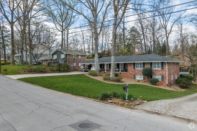 Homes in Leafmore-Creek Park Hill reside on lots with wooded yards and simple landscaping.