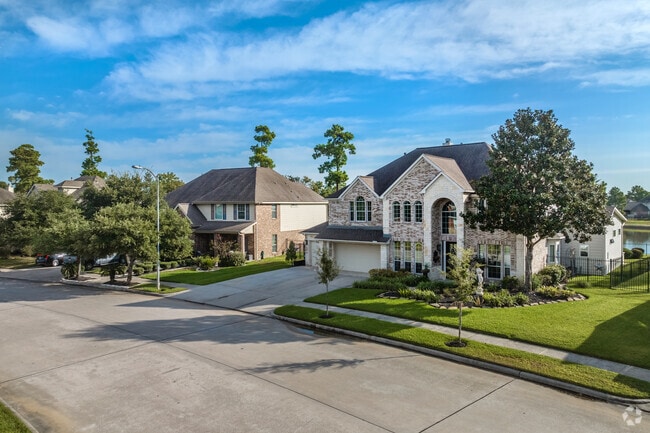 Manicured lawns are commonplace in Legends Ranch and frame the beautiful homes there.