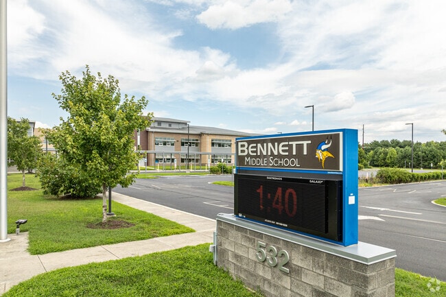 Bennett Middle School has 906 students in grades 6-9 with a student-teacher ratio of 11 to 1.