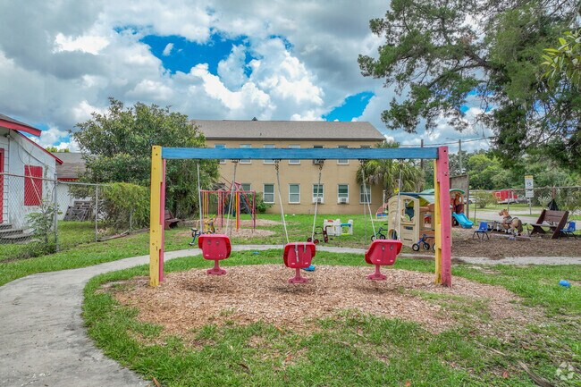 Mt. Calvary Sda School has many swingsets for kids to enjoy.