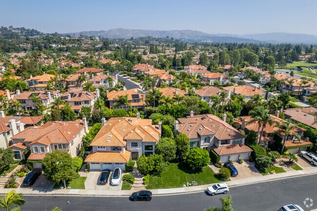 An elevated view of a Tustin Ranch community shows a selection of Mediterranean-style homes.