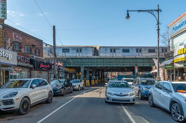 The Q train has stops in Sheepshead Bay; it’s about an hour and 10 minutes to Midtown.