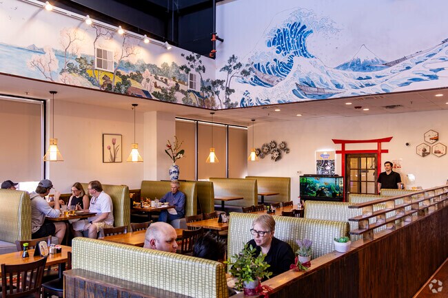 Diners grab a meal at Wasabi Bistro at the Pine Market in Wood Forest.
