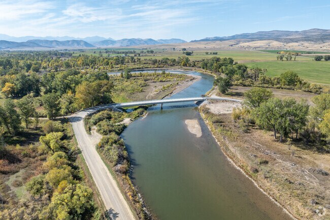 The Jefferson River flows peacefully through Willow Creek, offering stunning views and a serene.