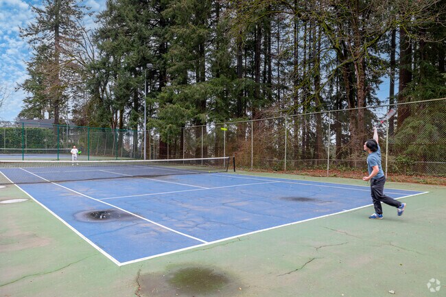 Tennis players playing a quick game at Washington Park in Arlington Heights, Oregon.