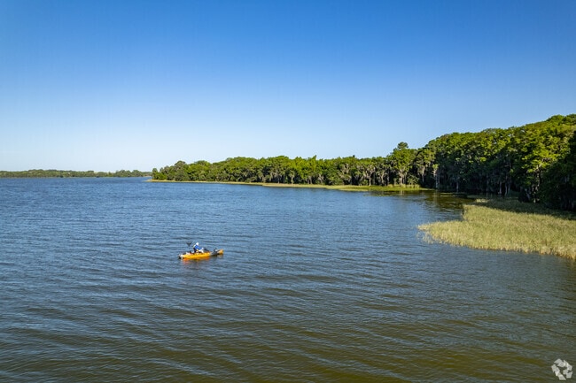 Locals enjoy the sunshine and Kayaking on Lake Yale.