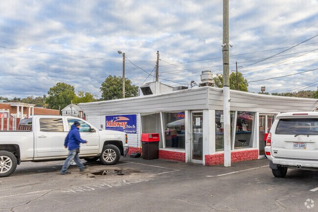 The Midway Drive-In is a classic American Burger and Shake restaurant with car-side service.
