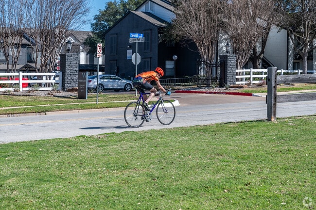 Residents bike the tree‑lined streets of Dalworthington Gardens to stay active.