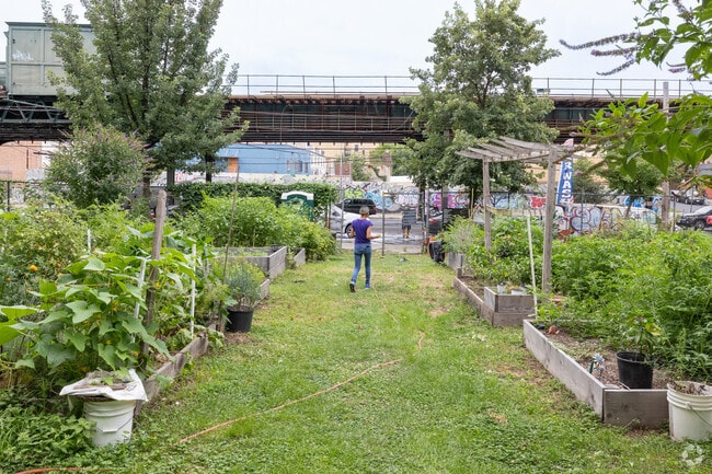 Members of the community in The Bronx spend time cultivating the Eagle Slope Community Garden.