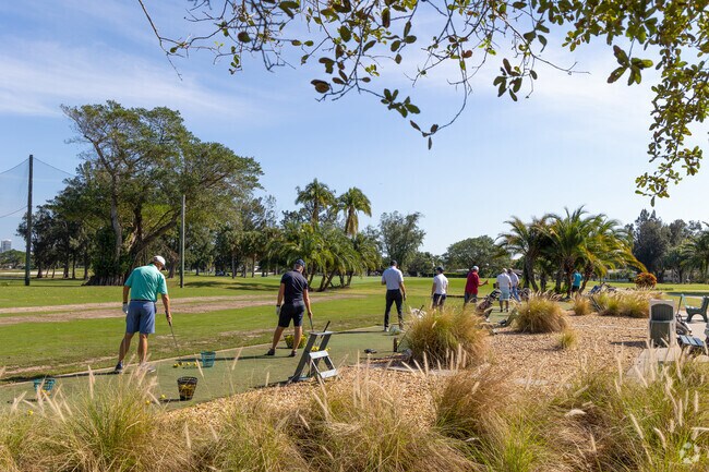 Isle of Normandy locals enjoy the range at Normandy Golf Club.