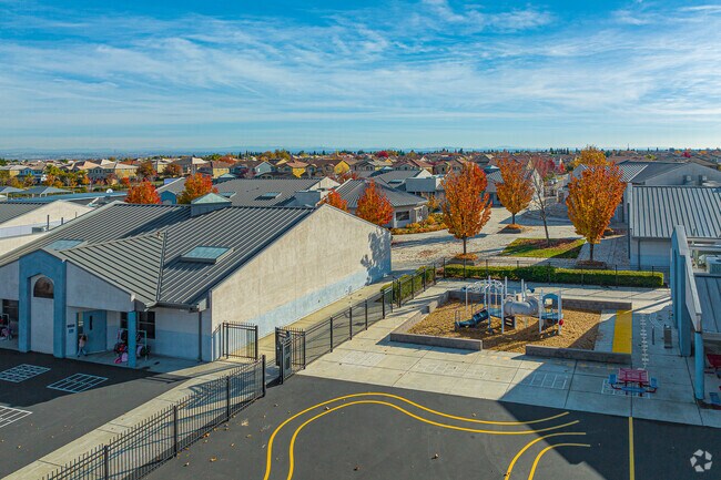 Young kids love the small play structure at Fiddyment Farm Elementary School.