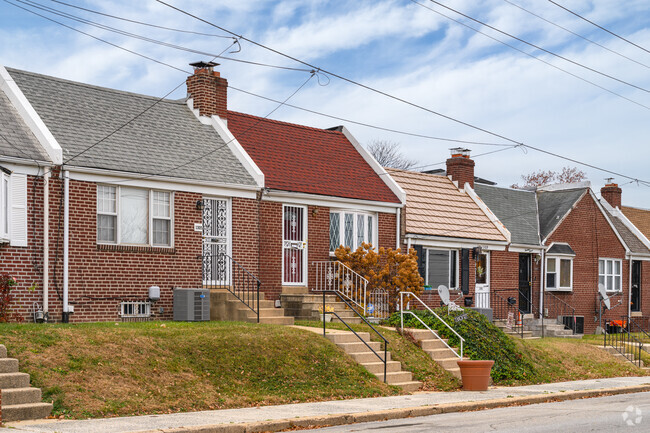 You'll never be far from neighbors in Riverside in a Cape Cod style row home.