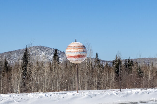 Stretching along Route 1, the Maine Solar System Model of Presque Isle offers a unique roadside attraction, where scaled planets dot the landscape, providing a tangible sense of the immense distances between celestial bodies.