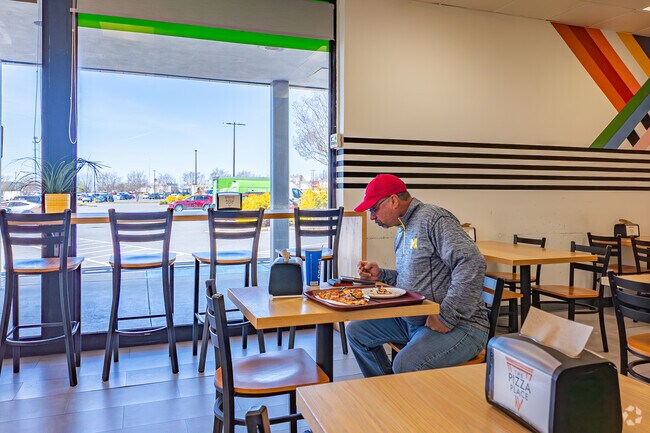 Konnoak pizza lovers head to The Pizza Place for a large slice.