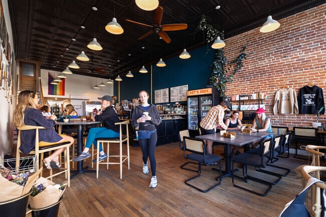 Coffee by Topo is a popular place for friends to enjoy drinks and pastries in Salida.