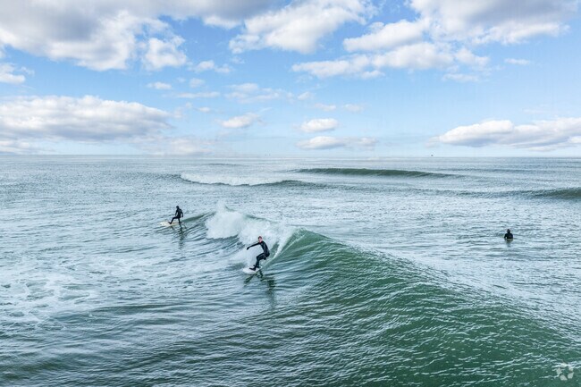 When the waves are pumping, Scituate surfers pack the point break at Peggotty  Beach.