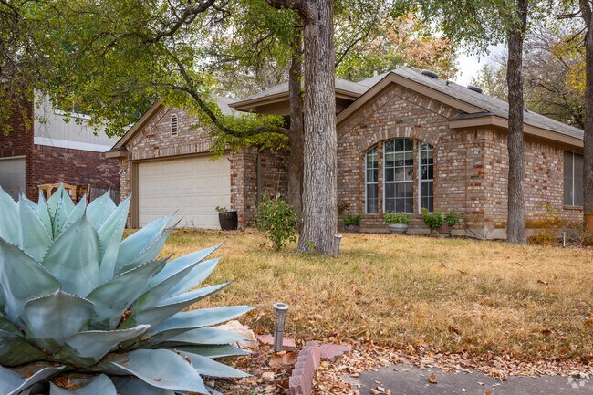 A single story traditional brick home commonly found in Maple Run.