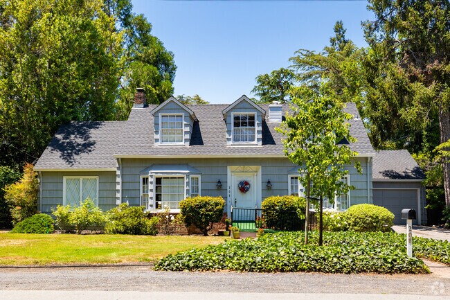 A colonial style home soaks up the sun on an open lot in Lindenwood.