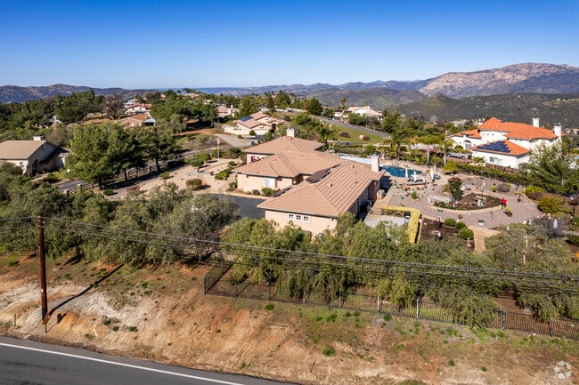 Bungalows and single-level homes line North Victoria Drive in Alpine.