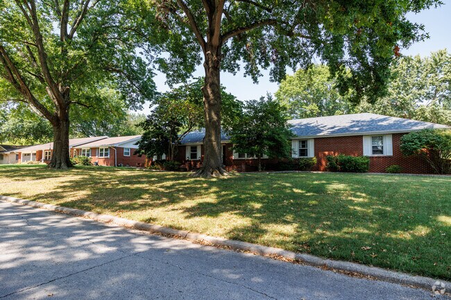 Homes throughout Southern Hills are surrounded by large, mature trees.