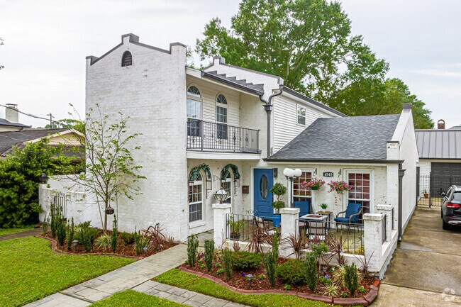 A large home with a front garden patio in the Pontchartrain Shores.