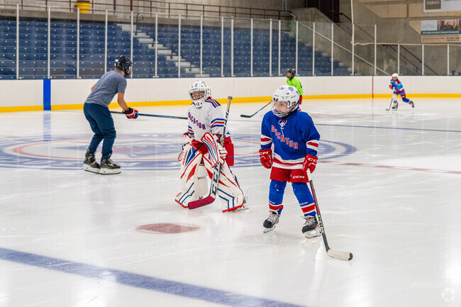 Decatur kids practice hockey skills at the Decatur Civic Center near the Muffley community.
