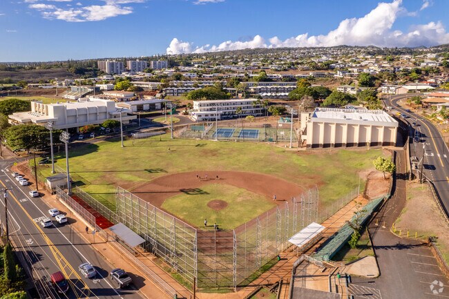 Overlooking historic Pearl Harbor, ʻAiea High School (AHS), home of Nā Aliʻi opened its doors in 1961.