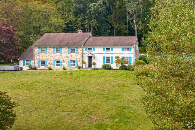 Large colonials stand out in Upper Providence Township with colorful shutters.