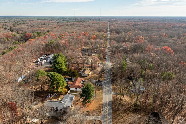 Chesilhurst is a rural neighborhood set among dense forests and connected by two-lane roads.