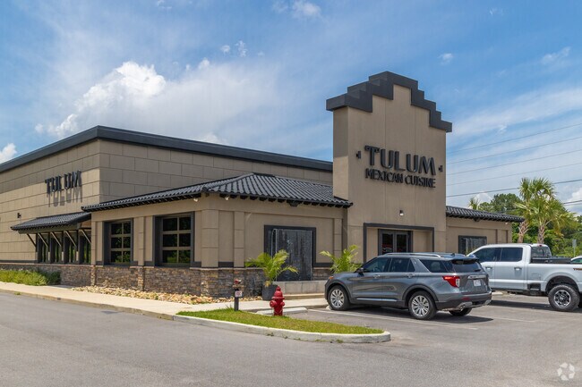 A vibrant atmosphere, rich history, and hospitality combine at Tulum near Plantation Hills.