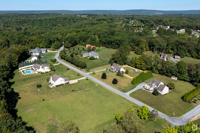 Upper Yoder homes feature large lots with scenic views and wooded surroundings.