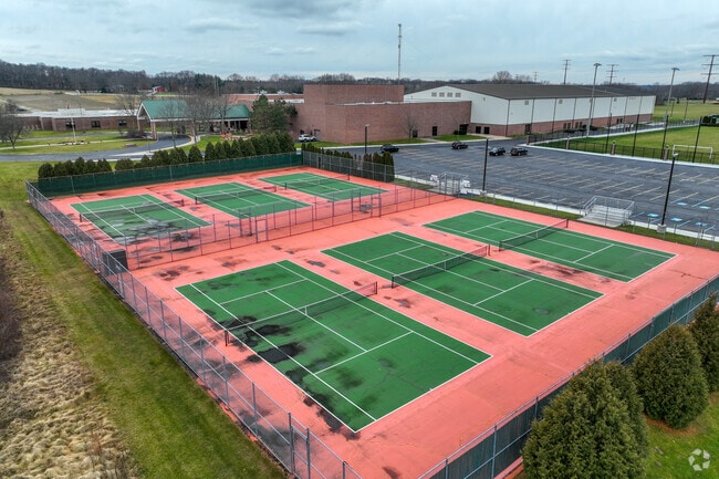 Wheeler High School has tennis courts.