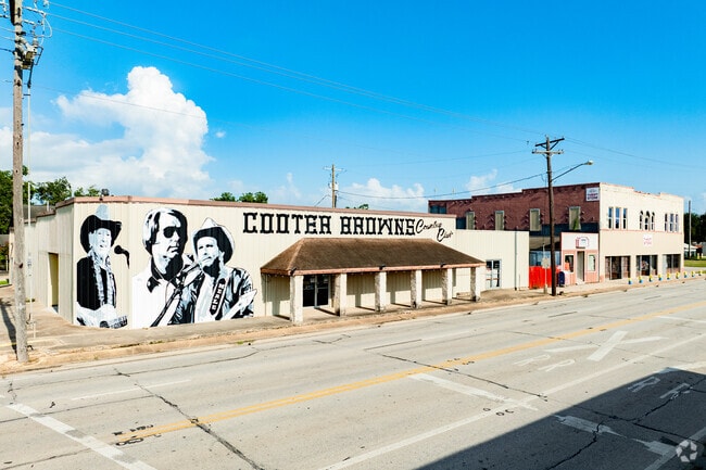 Cooter Brown's Country Club is a western dancehall, offering up cold drinks and bar games.