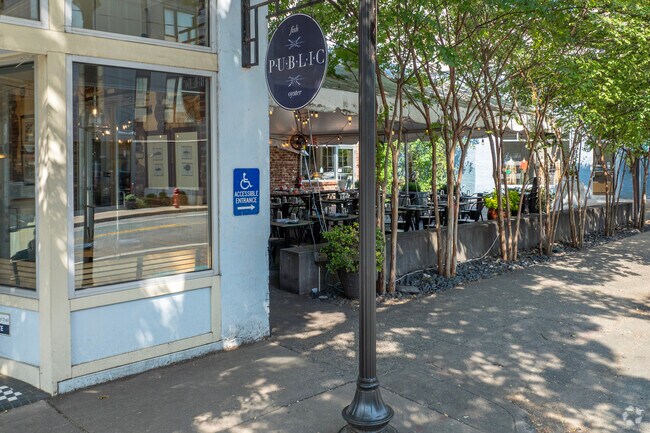 Public Fish and Oyster has a beautiful tree-lined patio on Main Street in Starr Hill.
