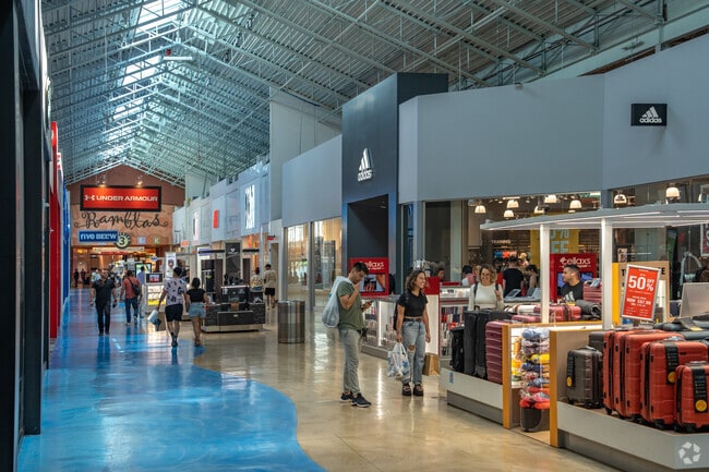 Dolphin Mall offers outlet shopping close to Vanderbilt Park.