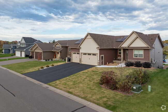 Traditional homes in East Bethel feature spacious yards and mature landscaping.