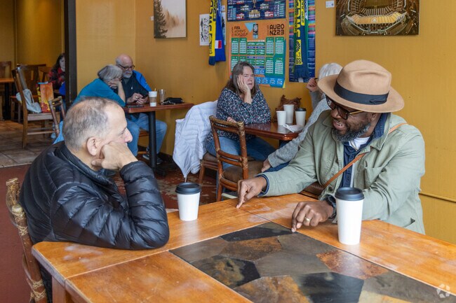 Friends from the Laurel area gather at World Ground for a coffee and catch up.