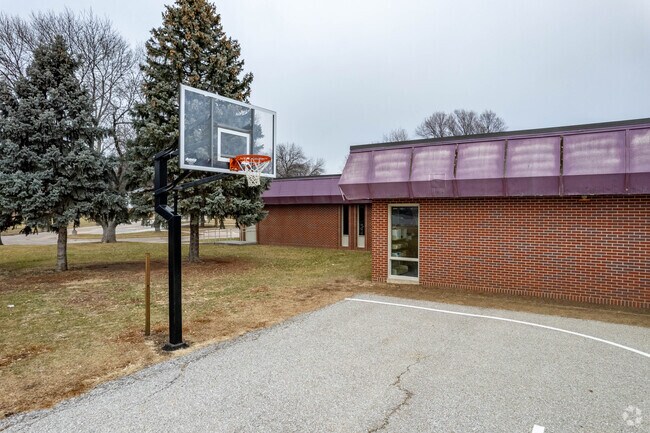 Students at Hitchcock Elementary School enjoy playing basketball.