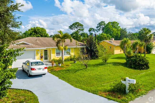 Many Cashmere Cove residents maintain a lush and manicured front yard.