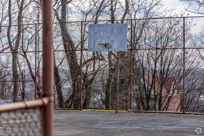 Kite Hill Park is a basketball court tucked into the woods of Garfield.